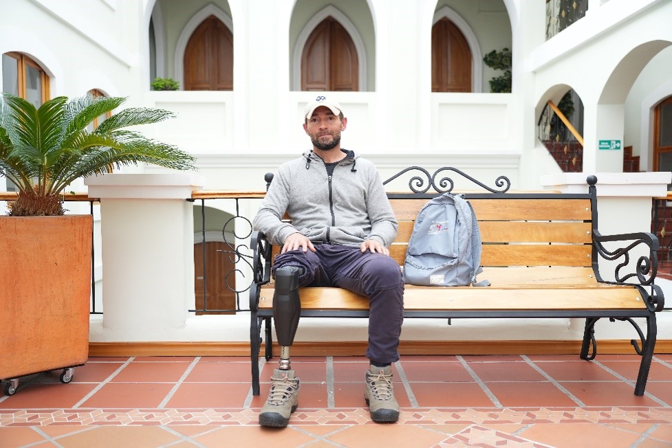 Andres, 41, was heavily injured in an explosive weapon accident, in Colombia. He sits in the patio of his building in Pasto.