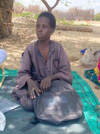 Mahamat with his schoolbag