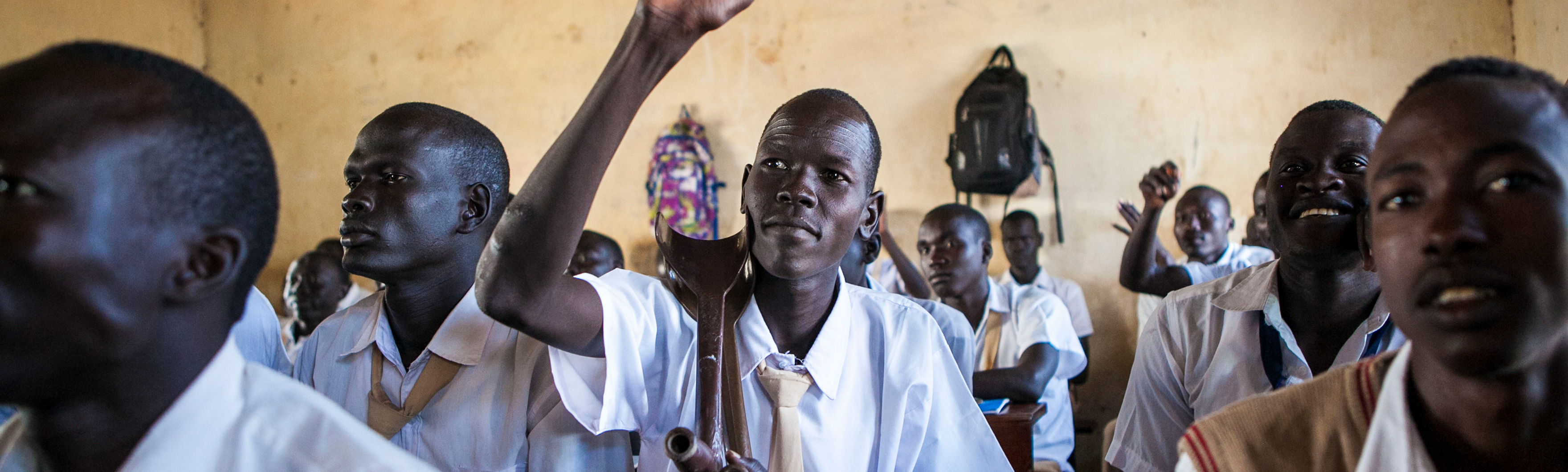 Kenya, Dak Pok, sud soudanais suit des cours à l’école Bantu au camp de réfugiés de Kakuma.