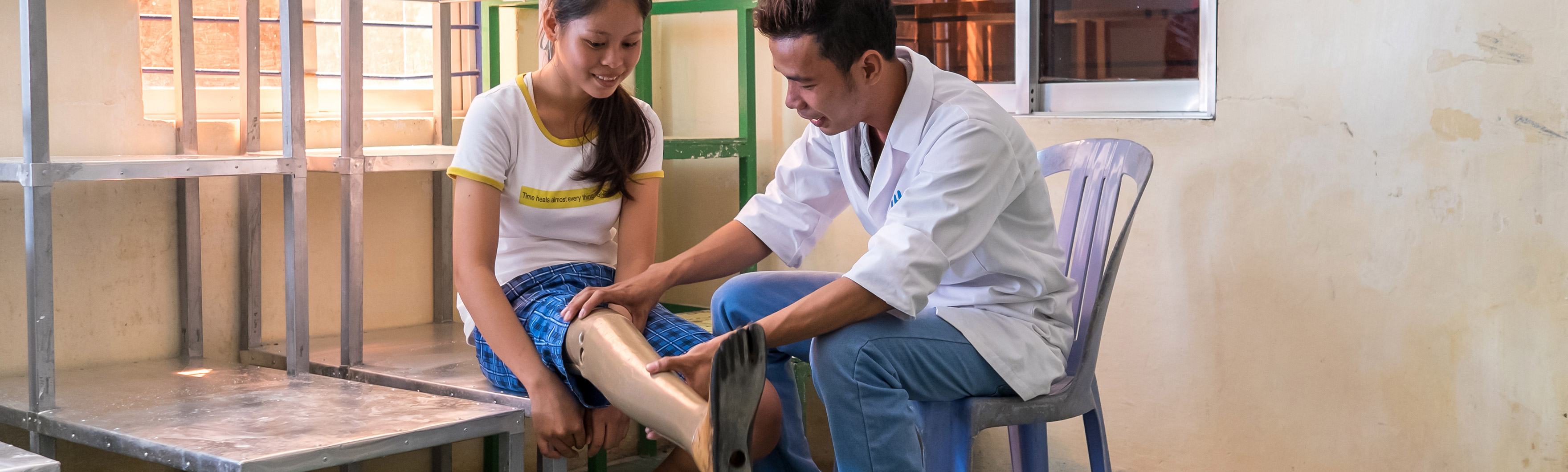 Cambodia, Kanha in rCambodia, Kanha in rehabilitation session with Vanno Leap from HI. Victim of an explosive remnant of war, Kanha was fitted with a prosthesis at Kampong Cham centre, where she returns for her follow-up.ehabilitation session with Vanno L
