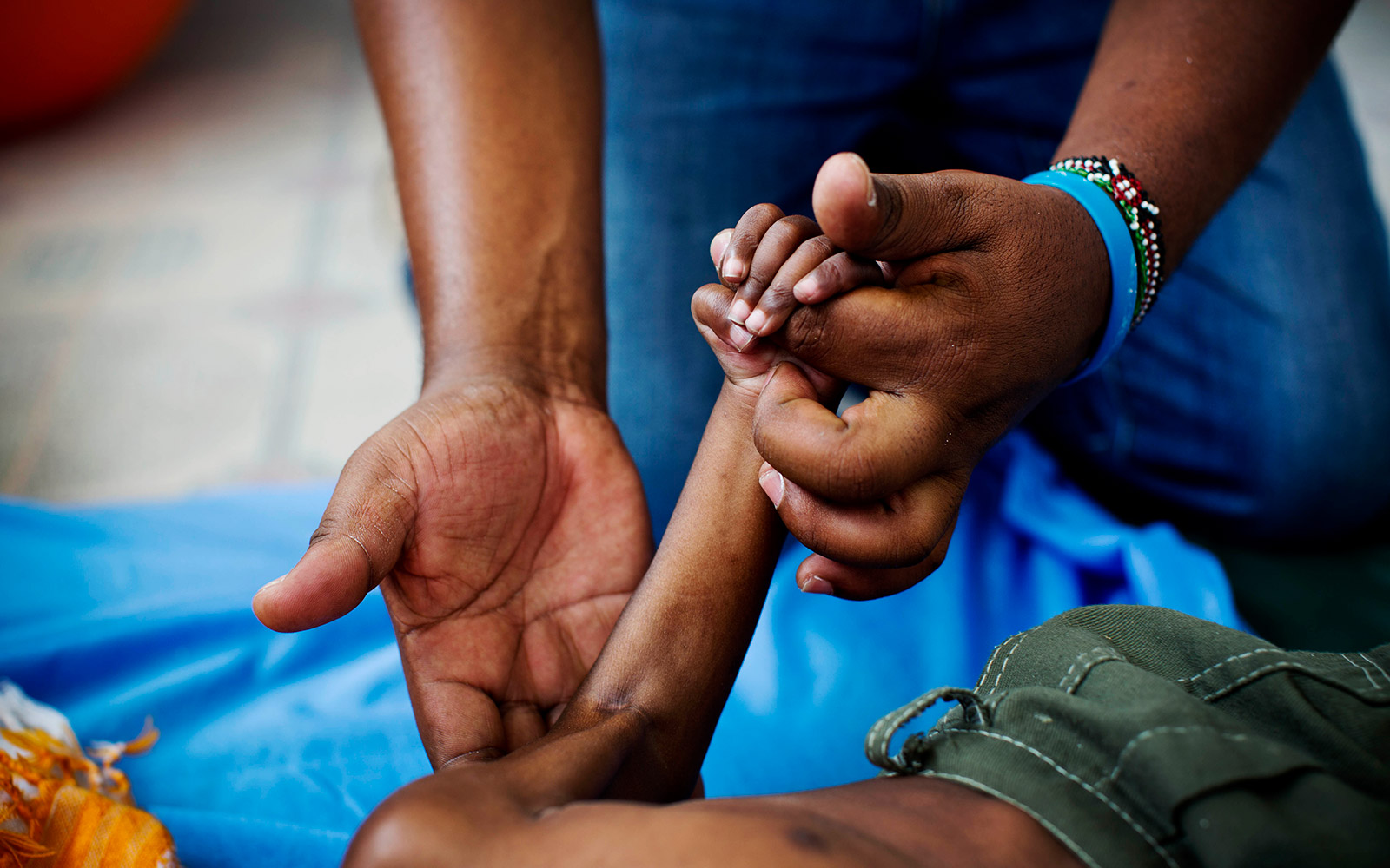 Kenya, Kakuma, Frank, who has cerebal palsy, receives physical therapy at the centre run by HI. 