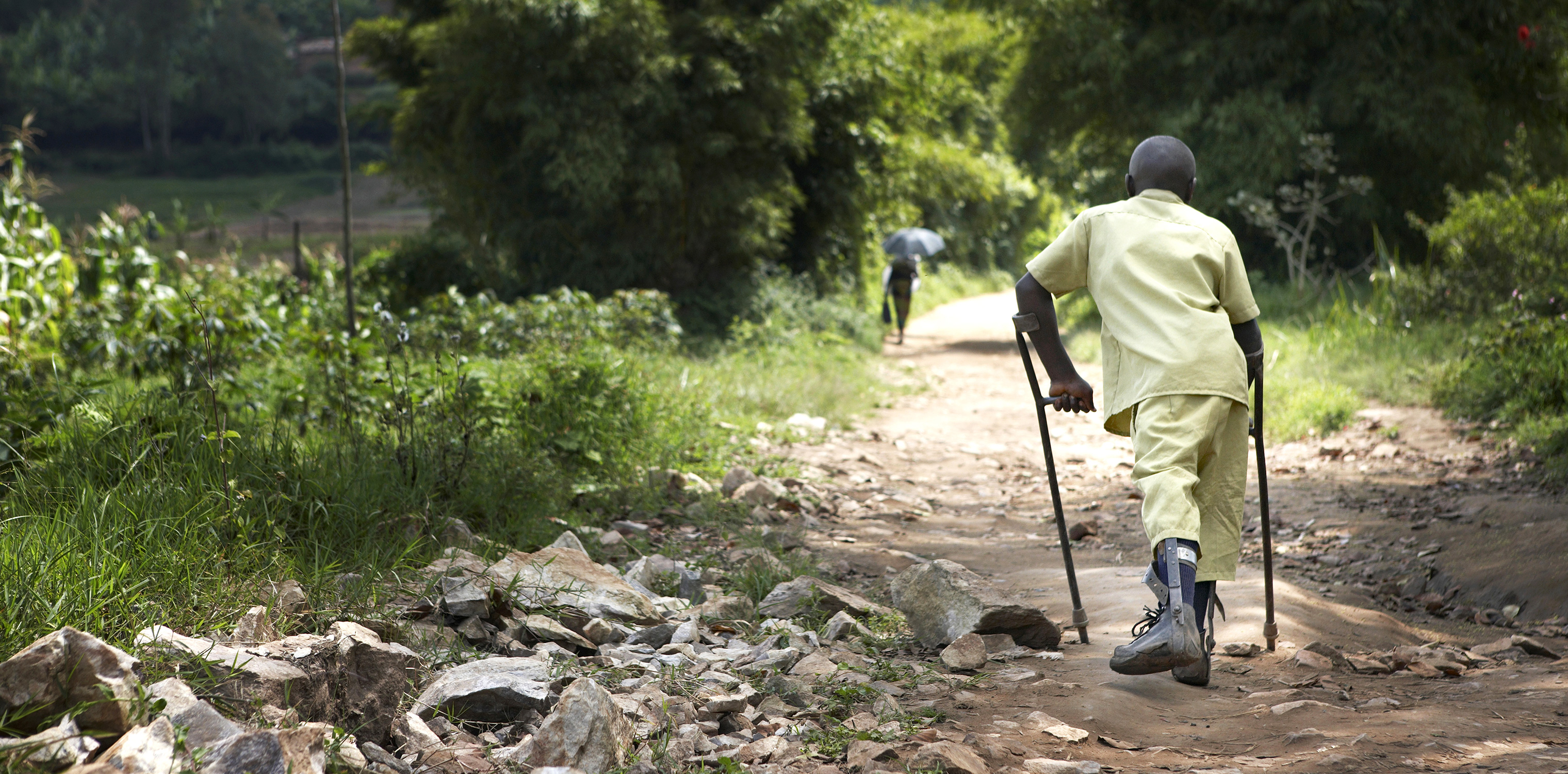 RWANDA - Inclusive Education / Claude Morakazi going from school back home, Muhanga District / May 2008