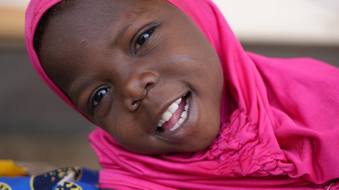 Portrait of Massalouka smiling at the camera