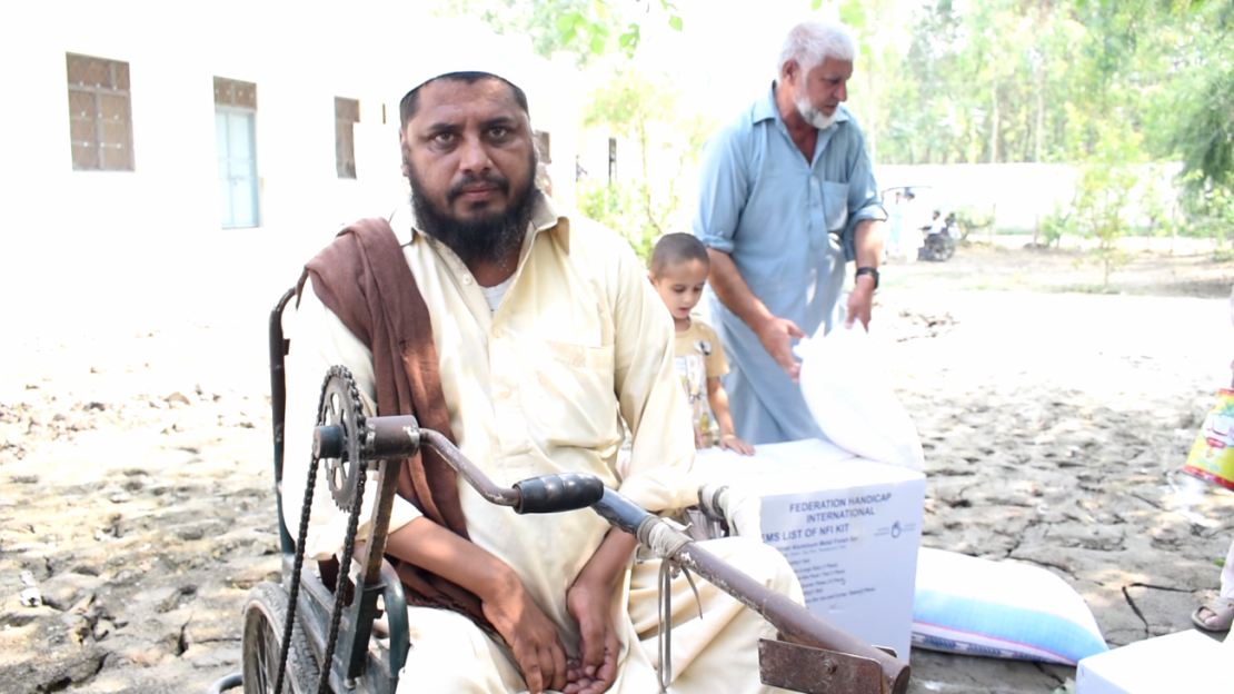 Imran Ullah receives his emergency supply donation.