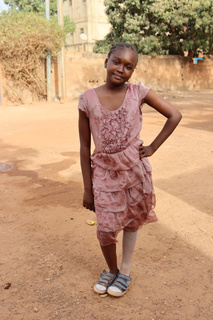 Perpétue chez elle, à Ouagadougou. © N. Lawson / HI