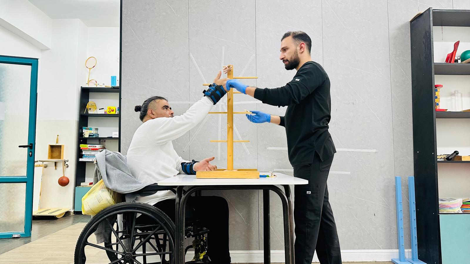 Afifi during a rehablitation session; }}