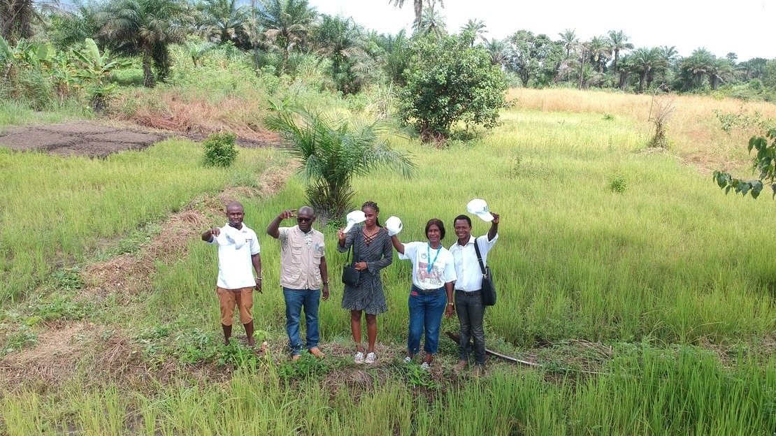 Dusu Naomi Lansana (second from right) and her colleagues on the inclusive farm.; }}