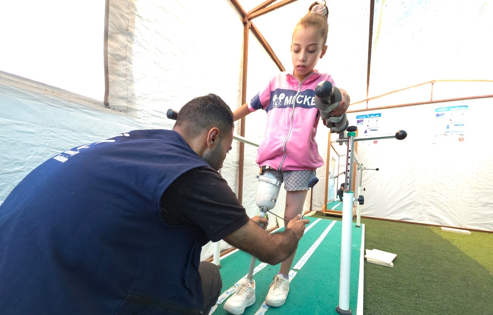 Malak, 9, walks with new artificial leg