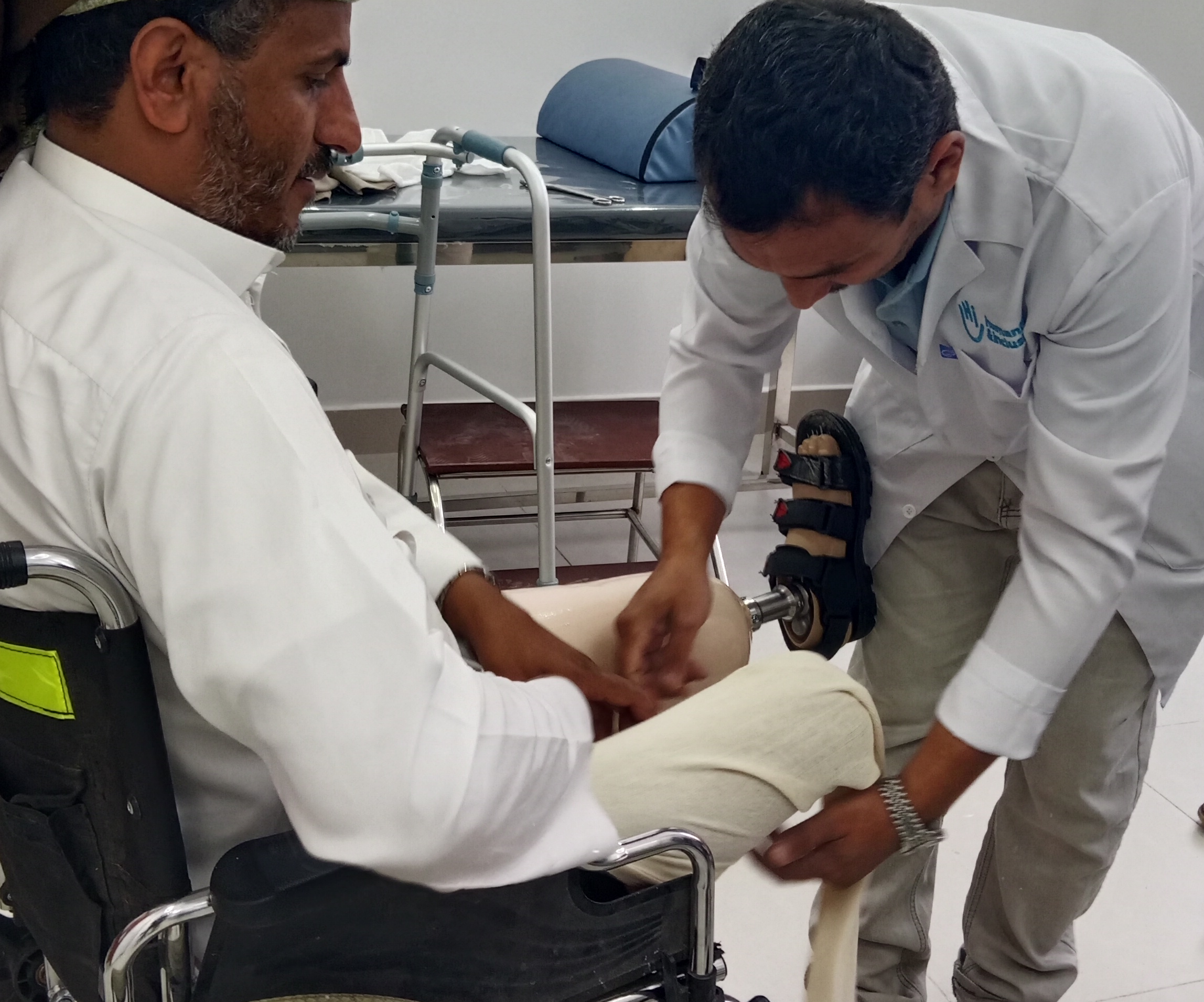 Mohammed has had both legs amputated. He walks again with prosthetics