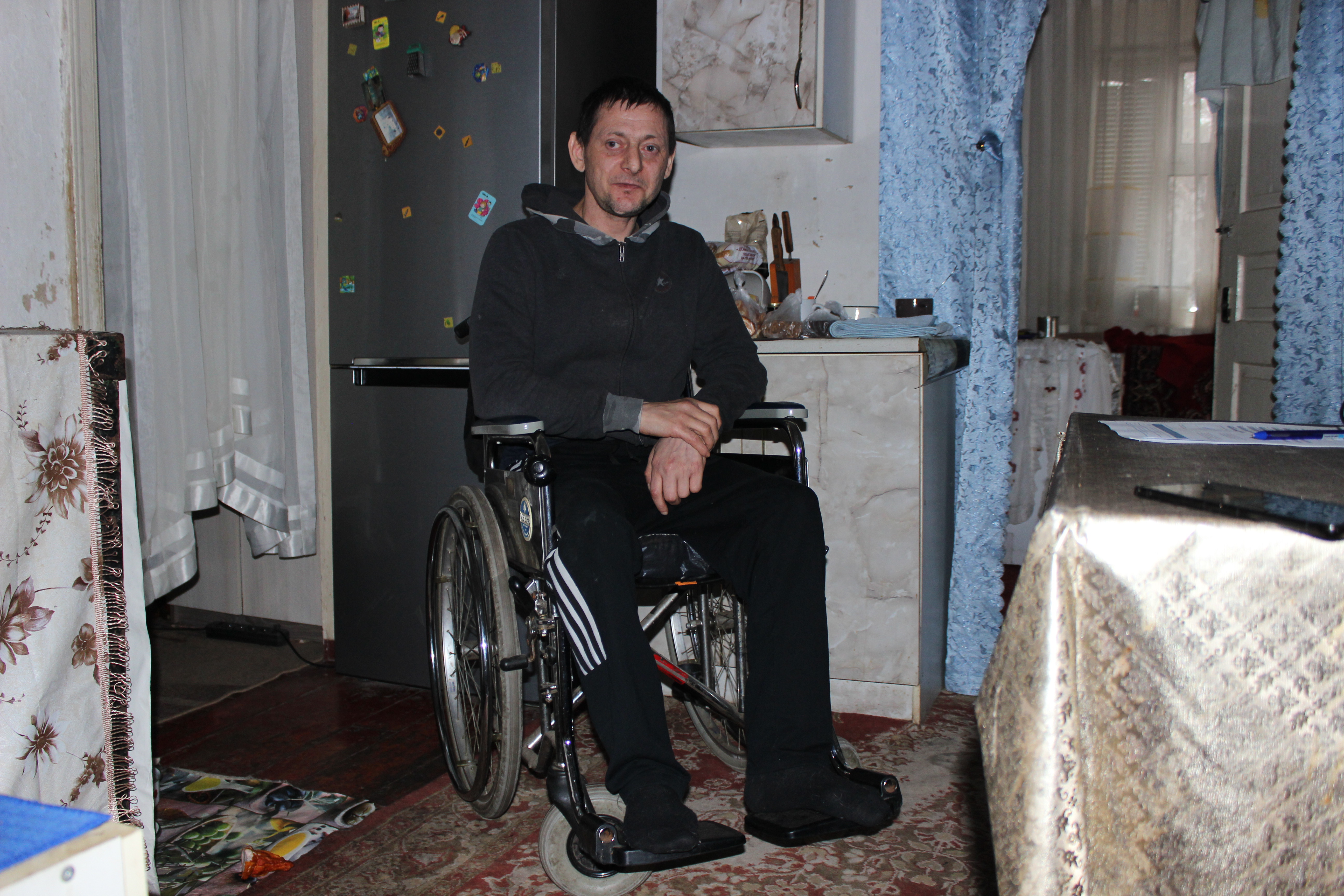 Oleksandr Hurtov has a disability following an unknown disease. He is now a displaced person after a drone attack at his place. HI. Dnipro, November 2025.; }}