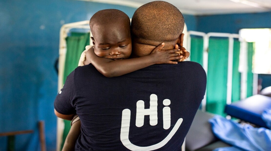 Simon Njenga, HI occupational therapist, during a rehabilitation session with Elizabeth Abiel at Rehabilitation Center 1 in Kakuma, Kenya. © Patrick Meinhardt / HI; }}
