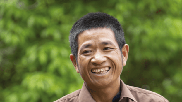 Portrait of Mr Khamphong.; }}