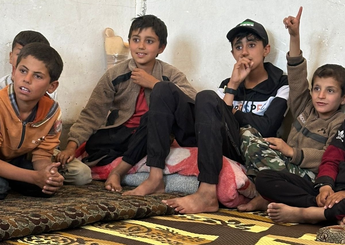 Maer (in the middle) during a risk education session; }}
